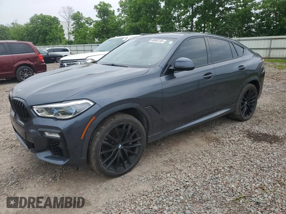 2021 BMW X6 M50i z VIN 5UXCY8C04M9D98591, wystawiony jako Copart lot #60606155 z przebiegiem 90 639 mil mil oraz Czysty tytuł • Clean title. Historia ofert i sprzedaży dostępna na DreamBid. Obrazek 1.