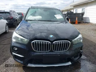 2018 BMW X1 xDrive28i z VIN WBXHT3C35J5L34646, wystawiony jako IAAI lot #41725131 z przebiegiem 81 983 mil mil oraz . Historia ofert i sprzedaży dostępna na DreamBid. Obrazek 12.