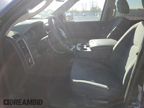 2015 Ram 1500 Tradesman with VIN 3C6RR7KTXFG676335, listed as a Copart auction lot 55204235 with 104,507 mi miles and Salvage title. Bid and sale history available at DreamBid. Image 7.