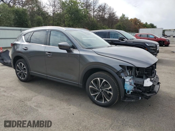 2023 Mazda CX-5 2.5 S Premium Package with VIN JM3KFBDM5P0229694, listed as a Copart auction lot 64811974 with 9,901 mi miles and Non Repairable. Bid and sale history available at carsss.com. Image 4.
