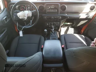 2019 Jeep Wrangler Unlimited Sport S with VIN 1C4HJXDG2KW516005, listed as a Copart auction lot 57330645 with 59,706 mi miles and Salvage title. Bid and sale history available at DreamBid. Image 8.