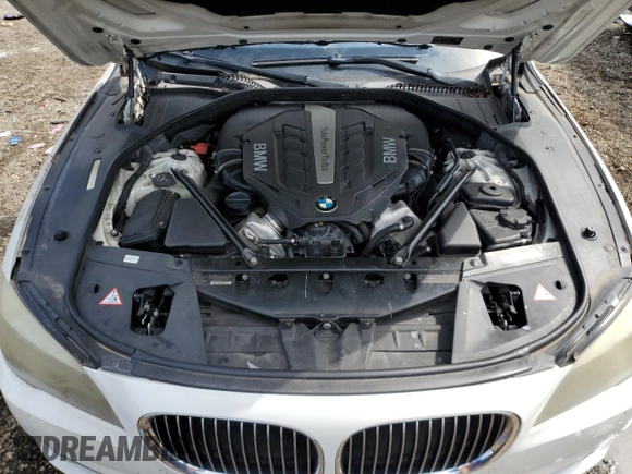 2012 BMW 7 Series 750Li с VIN WBAKB8C55CC962772, выставлен на аукционе Copart как лот 57621525 с пробегом 127 259 миль миль и Списание • Salvage title. История ставок и продаж доступна на DreamBid. Изображение 11.