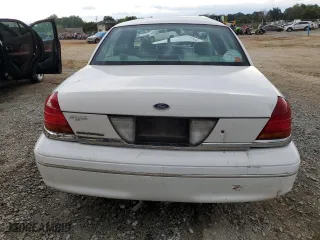 2003 Ford Crown Victoria LX with VIN 2FAFP74W03X158931, listed as a Copart auction lot 71588824 with 165,074 mi miles and Salvage Title. Bid and sale history available at carsss.com. Image 6.