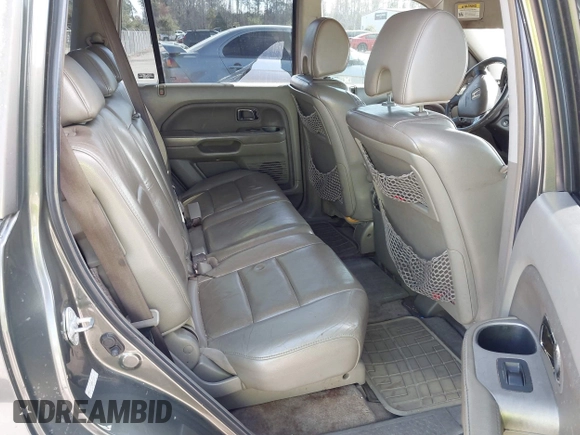 2006 Honda Pilot EX-L with VIN 2HKYF18786H506289, listed as a IAAI auction lot 41507906 with 283,470 mi miles and . Bid and sale history available at DreamBid. Image 8.