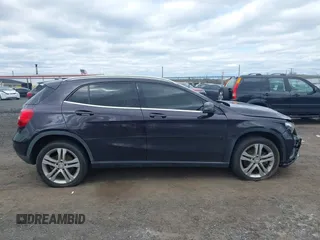 2015 Mercedes-Benz GLA 250 z VIN WDCTG4GB0FJ114889, wystawiony jako IAAI lot #42049338 z przebiegiem 83 676 mil mil oraz . Historia ofert i sprzedaży dostępna na DreamBid. Obrazek 13.