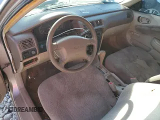 2000 Chevrolet Prizm z VIN 1Y1SK5284YZ407566, wystawiony jako Copart lot #86148464 z przebiegiem 193 844 mil mil oraz Szkoda całkowita • Salvage title. Historia ofert i sprzedaży dostępna na DreamBid. Obrazek 8.