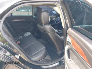 2016 Cadillac CTS AWD with VIN 1G6AW5SX7G0129019, listed as a IAAI auction lot 42148335 with 86,023 mi miles and . Bid and sale history available at DreamBid. Image 8.