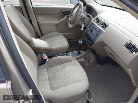 2005 Ford Focus S with VIN 1FAHP34N35W144951, listed as a IAAI auction lot 41880459 with 141,333 mi miles and . Bid and sale history available at carsss.com. Image 5.