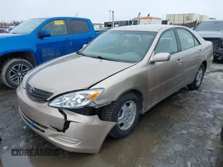 2002 Toyota Camry XLE z VIN 4T1BF32K42U533788, wystawiony jako IAAI lot #42024918 z przebiegiem 120 168 mil mil oraz . Historia ofert i sprzedaży dostępna na DreamBid. Obrazek 17.