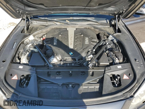 2013 BMW 7 Series 750Li xDrive with VIN WBAYF8C57DD140694, listed as a Copart auction lot 56983435 with 113,444 mi miles and Salvage title. Bid and sale history available at DreamBid. Image 11.