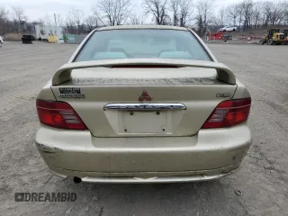 2001 Mitsubishi Galant ES z VIN 4A3AA46G51E020677, wystawiony jako Copart lot #87795655 z przebiegiem 61 145 mil mil oraz Tytuł czysty. Historia ofert i sprzedaży dostępna na DreamBid. Obrazek 6.