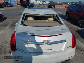 2015 Cadillac CTS Luxury AWD z VIN 1G6AX5SX9F0107244, wystawiony jako IAAI lot #42386444 z przebiegiem 171 413 mil mil oraz . Historia ofert i sprzedaży dostępna na DreamBid. Obrazek 6.