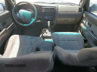 1999 Toyota Tacoma PreRunner with VIN 4TASN92N7XZ573079, listed as a Copart auction lot 56917035 with 254,939 mi miles and Salvage title. Bid and sale history available at DreamBid. Image 8.