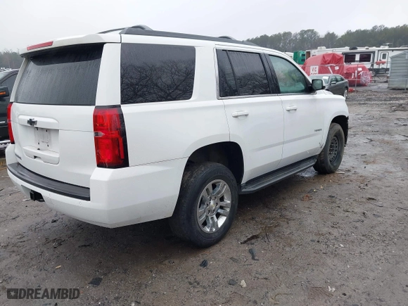 2017 Chevrolet Tahoe LS with VIN 1GNSCAKC3HR265961, listed as a IAAI auction lot 41426651 with 117,331 mi miles. Bid and sale history available at carsss.com. Image 4.