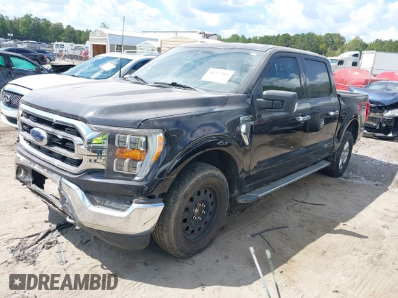 2021 Ford F-150 XL with VIN 1FTFW1E5XMKE21429, listed as a IAAI auction lot 40347406 with 125,000 mi miles. Bid and sale history available at carsss.com. Image 2.