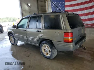 1998 Jeep Grand Cherokee Limited with VIN 1J4GZ78Y8WC285670, listed as a Copart auction lot 70213044 with 128,382 mi miles and Clean Title. Bid and sale history available at carsss.com. Image 2.