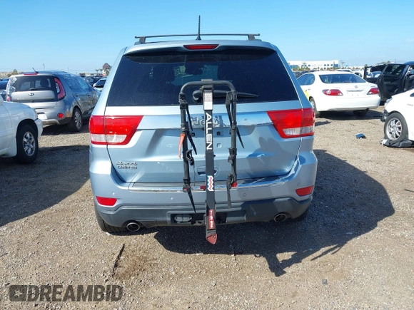 2012 Jeep Grand Cherokee Limited z VIN 1C4RJFBTXCC341813, wystawiony jako IAAI lot #41791662 z przebiegiem 120 811 mil mil oraz . Historia ofert i sprzedaży dostępna na DreamBid. Obrazek 17.