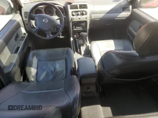 2003 Nissan Xterra SE z VIN 5N1MD28Y63C630003, wystawiony jako Copart lot #54352935 z przebiegiem 75 798 mil mil oraz Szkody całkowita. Historia ofert i sprzedaży dostępna na DreamBid. Obrazek 8.