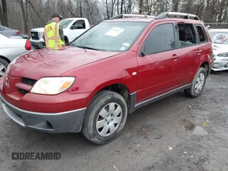 2006 Mitsubishi Outlander LS with VIN JA4LZ31F06U018534, listed as a IAAI auction lot 41800157 with 158,943 mi miles. Bid and sale history available at carsss.com. Image 2.