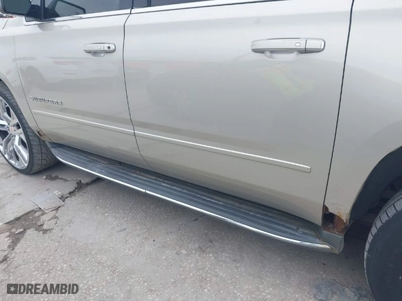 2015 Chevrolet Suburban LTZ with VIN 1GNSKKKC0FR525772, listed as a IAAI auction lot 41745084 with 187,981 mi miles. Bid and sale history available at carsss.com. Image 21.