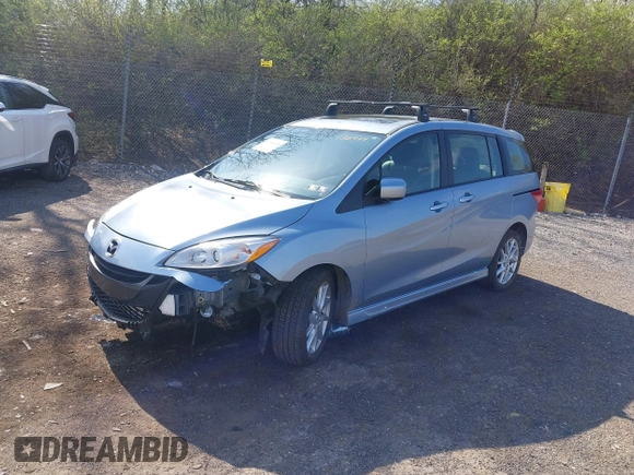 2012 Mazda 5 Grand Touring with VIN JM1CW2DL6C0138979, listed as a IAAI auction lot 41936188 with 57,963 mi miles and . Bid and sale history available at carsss.com. Image 2.