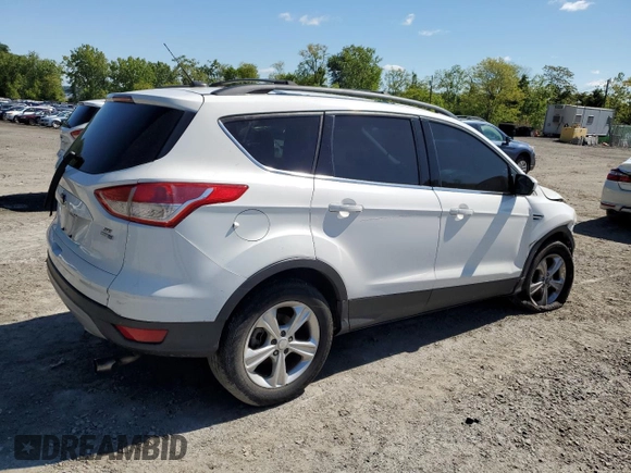 2013 Ford Escape SE z VIN 1FMCU9G99DUC73121, wystawiony jako Copart lot #57966605 z przebiegiem 169 764 mil mil oraz Szkoda całkowita • Salvage title. Historia ofert i sprzedaży dostępna na DreamBid. Obrazek 3.