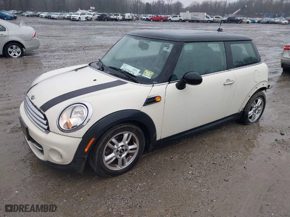 2012 MINI Cooper Hardtop with VIN WMWSU3C5XCT542275, listed as a IAAI auction lot 41870576 with 84,712 mi miles. Bid and sale history available at carsss.com. Image 2.