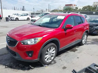2015 Mazda CX-5 Grand Touring with VIN JM3KE2DY7F0537017, listed as a IAAI auction lot 41953011 with 78,098 mi miles. Bid and sale history available at carsss.com. Image 2.
