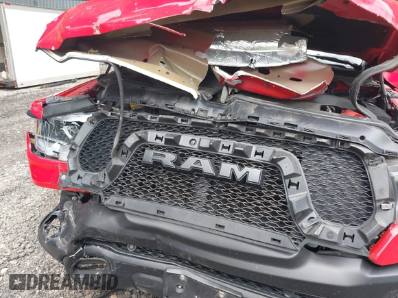 2021 Ram 1500 Rebel with VIN 1C6SRFLT2MN591844, listed as a IAAI auction lot 40410248 with 84,759 mi miles and . Bid and sale history available at DreamBid. Image 6.