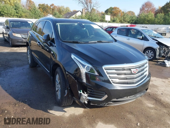 2018 Cadillac XT5 Luxury AWD with VIN 1GYKNDRS6JZ199827, listed as a IAAI auction lot 40699590 with 92,557 mi miles and . Bid and sale history available at DreamBid. Image 1.