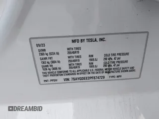 2023 Tesla Model Y Long Range with VIN 7SAYGDEE2PF874729, listed as a IAAI auction lot 41518376 with 10,927 mi miles and . Bid and sale history available at DreamBid. Image 9.