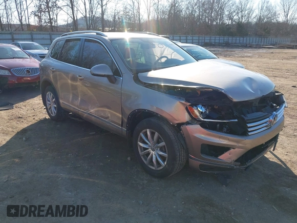 2016 Volkswagen Touareg Sport with VIN WVGEF9BP0GD003241, listed as a IAAI auction lot 41498797 with 90,141 mi miles and . Bid and sale history available at DreamBid. Image 1.