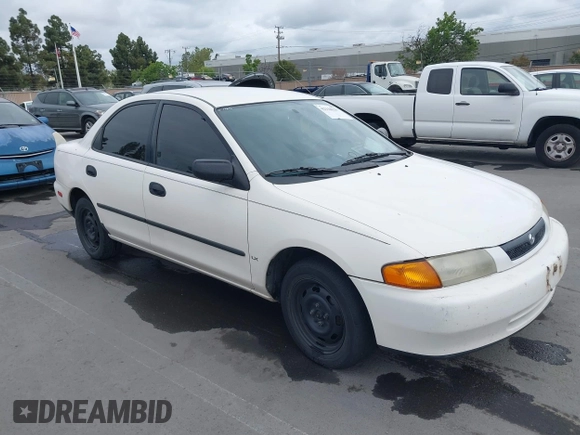 1997 Mazda Protege DX with VIN JM1BC1417V0156858, listed as a IAAI auction lot 42118339 with 187,673 mi miles and . Bid and sale history available at DreamBid. Image 1.
