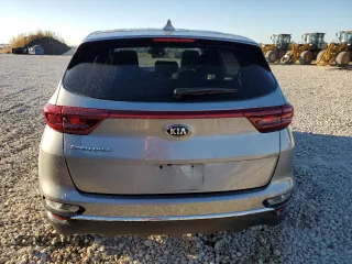 2021 Kia Sportage LX with VIN KNDPMCAC0M7945282, listed as a Copart auction lot 79599224 with 84,685 mi miles and Clean Title. Bid and sale history available at carsss.com. Image 6.