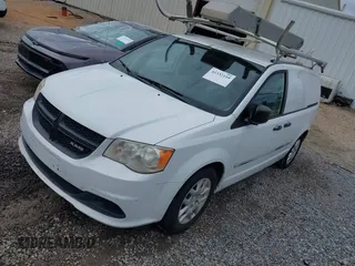 2014 Ram Cargo Van Tradesman with VIN 2C4JRGAG6ER389982, listed as a IAAI auction lot 41332110 with 133,351 mi miles. Bid and sale history available at carsss.com. Image 2.