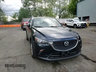 2018 Mazda CX-3 Sport z VIN JM1DKFB79J1323497, wystawiony jako Copart lot #56168875 z przebiegiem 60 284 mil mil oraz Szkoda całkowita • Salvage title. Historia ofert i sprzedaży dostępna na DreamBid. Obrazek 14.