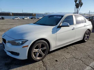 2015 BMW 3 Series 328i with VIN WBA3C1C52FP853191, listed as a Copart auction lot 49509475 with 90,420 mi miles and Salvage title. Bid and sale history available at DreamBid. Image 1.