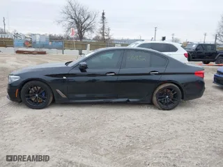 2018 BMW 5 Series M550i xDrive with VIN WBAJB9C57JB036653, listed as a IAAI auction lot 41512154 with 1 mi miles. Bid and sale history available at carsss.com. Image 13.