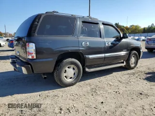2004 GMC Yukon SLE with VIN 1GKEK13V24J236327, listed as a Copart auction lot 76896974 with 151,028 mi miles and Salvage Title. Bid and sale history available at carsss.com. Image 3.
