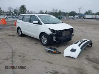 2017 Kia Sedona L with VIN KNDMA5C16H6285084, listed as a IAAI auction lot 41779420 with 104,294 mi miles. Bid and sale history available at carsss.com. Image 1.