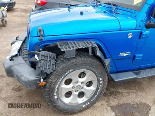 2015 Jeep Wrangler Sahara with VIN 1C4AJWBG9FL663959, listed as a IAAI auction lot 42133900 with 56,253 mi miles and . Bid and sale history available at DreamBid. Image 6.