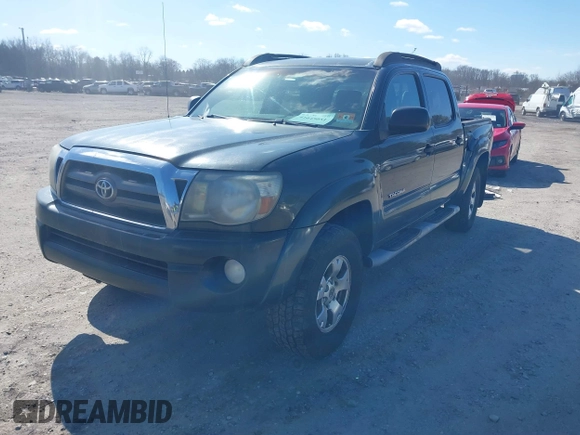 2009 Toyota Tacoma z VIN 3TMLU42N79M027935, wystawiony jako IAAI lot #41645051 z przebiegiem 341 601 mil mil oraz . Historia ofert i sprzedaży dostępna na DreamBid. Obrazek 19.