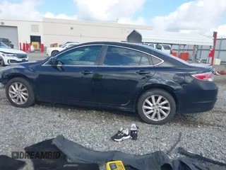 2009 Mazda 6 i Sport with VIN 1YVHP81A595M00988, listed as a IAAI auction lot 42622271 with 151,652 mi miles and . Bid and sale history available at DreamBid. Image 14.