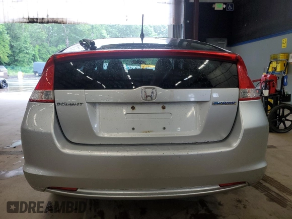 2010 Honda Insight LX z VIN JHMZE2H5XAS018546, wystawiony jako Copart lot #61411545 z przebiegiem 55 814 mil mil oraz Czysty tytuł • Clean title. Historia ofert i sprzedaży dostępna na DreamBid. Obrazek 6.
