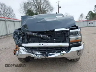 2018 Chevrolet Silverado 1500 LT with VIN 3GCPCREC1JG497019, listed as a IAAI auction lot 41459936 with 52,691 mi miles and . Bid and sale history available at DreamBid. Image 12.