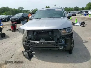 2018 Dodge Durango GT z VIN 1C4RDHDGXJC213152, wystawiony jako Copart lot #56956595 z przebiegiem 162 507 mil mil oraz Szkoda całkowita • Salvage title. Historia ofert i sprzedaży dostępna na DreamBid. Obrazek 14.