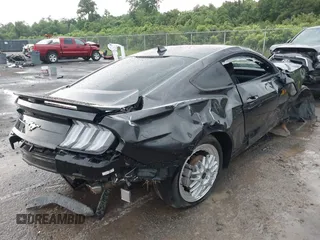 2022 Ford Mustang EcoBoost with VIN 1FA6P8TH2N5113664, listed as a IAAI auction lot 42314252 with 55,130 mi miles and . Bid and sale history available at DreamBid. Image 4.