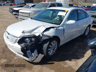 2007 Hyundai Azera SE z VIN KMHFC46F57A210341, wystawiony jako IAAI lot #41729427 z przebiegiem 113 301 mil mil oraz . Historia ofert i sprzedaży dostępna na DreamBid. Obrazek 2.