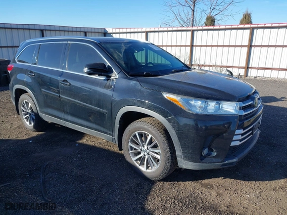 2019 Toyota Highlander SE with VIN 5TDJZRFH3KS580338, listed as a IAAI auction lot 41736059 with 128,487 mi miles. Bid and sale history available at carsss.com. Image 1.