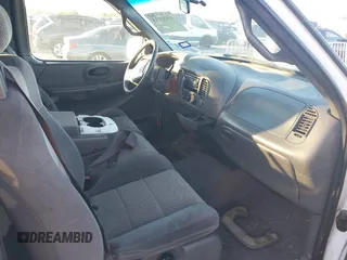2001 Ford F-150 XL с VIN 1FTRX17W61KF65488, выставлен на аукционе IAAI как лот 40807535 с пробегом 298 274 миль миль и . История ставок и продаж доступна на DreamBid. Изображение 5.